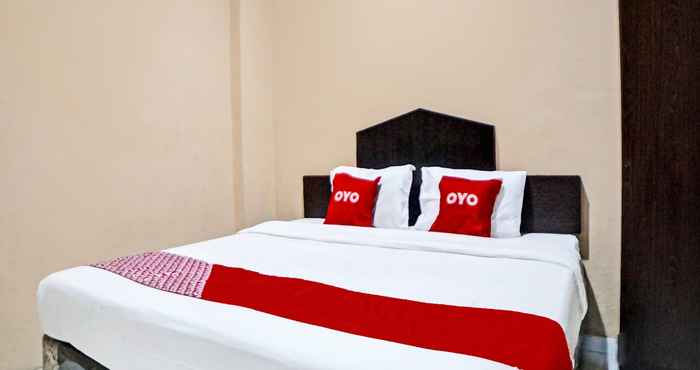 Kamar Tidur OYO 92158 Ralica Residence