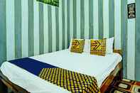 Kamar Tidur SPOT ON 92169 Homestay Zahra Syariah