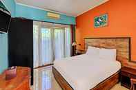 ห้องนอน OYO 92175 Surya Madu Guest House Near Pantai Kelan