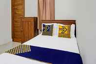 Bedroom SPOT ON 92183 Komang Resort Klayar
