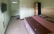 Kamar Tidur 5 Karina Guest House Syariah