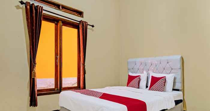 Kamar Tidur OYO 92217 Artana Bed and Breakfast