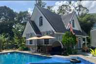 Kolam Renang OYO Home 90711 Roses Villa