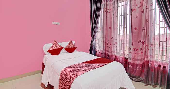 ห้องนอน OYO 92177 Arafah Homestay Syariah