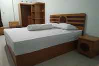 Bedroom OYO 92243 Fanilly Guest House Marabahan