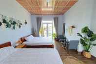 Kamar Tidur Nha Dien Vi Homestay