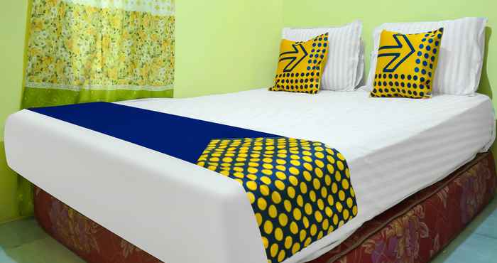 Kamar Tidur SPOT ON 92246 Kost Qiu Qiu 99