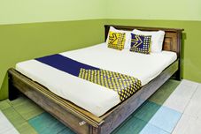 Bedroom SPOT ON 92264 Argo Homestay