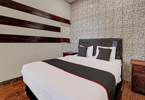 Bedroom Capital O 92276 Hotel Pesona Gunung