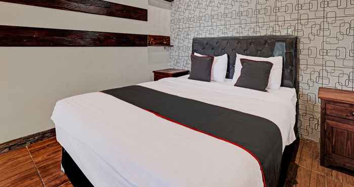Bedroom Capital O 92276 Hotel Pesona Gunung