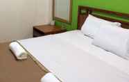 Bedroom 5 OYO 90742 I-home Hotel