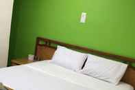 Bedroom OYO 90742 I-home Hotel