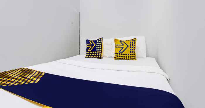 Kamar Tidur SPOT ON 92257 Orchid Guest House