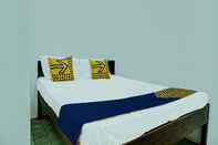 Kamar Tidur SPOT ON 92301 Penginapan Indola