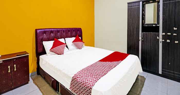 Bedroom OYO 92322 Hasan House Syariah
