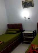 BEDROOM OYO 92337 Wisma Arwini Syariah