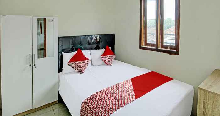 Phòng ngủ OYO 92312 A+ Cozy Rooms Syariah