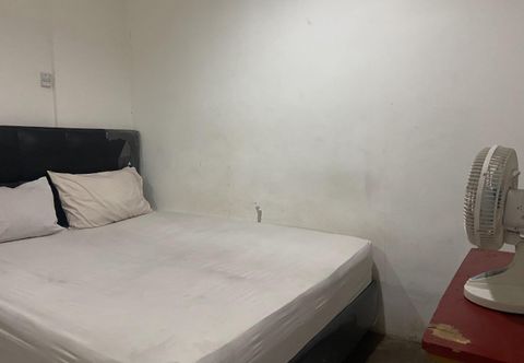Bedroom SPOT ON 92325 Penginapan Fajar Syariah