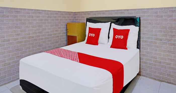 ห้องนอน OYO 92359 Kost Maluku 36 Blitar