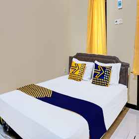 Bedroom 1 OYO Life 92353 Purnama Syariah Guest House, Wonodadi 酒店