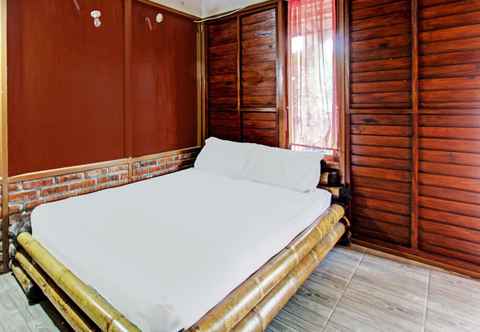 Bedroom OYO 92354 Samalas Syariah Homestay