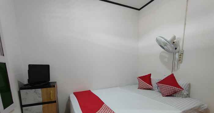 Bedroom OYO 92357 Zzip Homestay