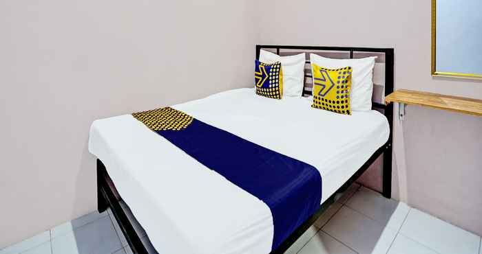 Bedroom SPOT ON 92370 Sobat Ijen Homestay