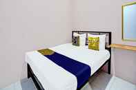 Bedroom SPOT ON 92370 Sobat Ijen Homestay