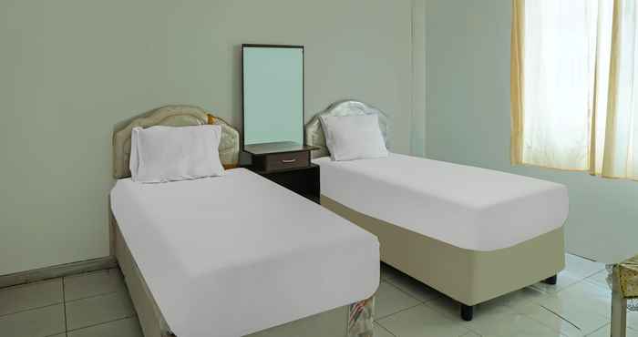 Kamar Tidur SPOT ON 92390 Wilma Kost Syariah