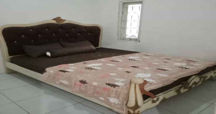 Bedroom EXPRESS O 92303 Homestay Mutiara Wonosobo Syariah