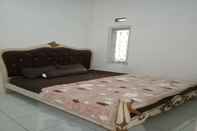 Bedroom EXPRESS O 92303 Homestay Mutiara Wonosobo Syariah