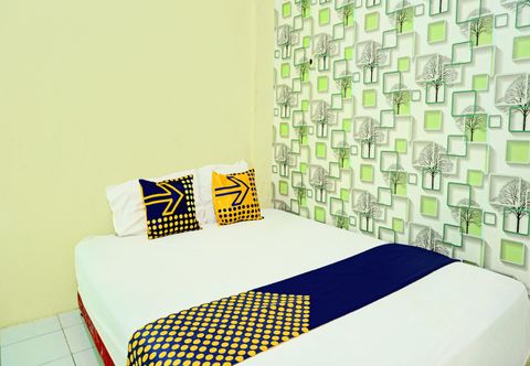 Phòng ngủ Hotel O Dhaha Penginapan House Syariah