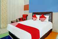 Bedroom OYO 92405 Evergreen Hotel & Resto