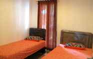 Kamar Tidur 5 D'HOME GUESTHOUSE