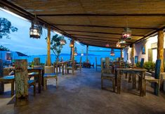 レストラン 4 Eden Beach Bungalows