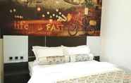 Kamar Tidur 6 Malang City Boulevard Homestay & Restaurant