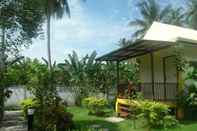 ห้องนอน Ruen Ton Num Resort