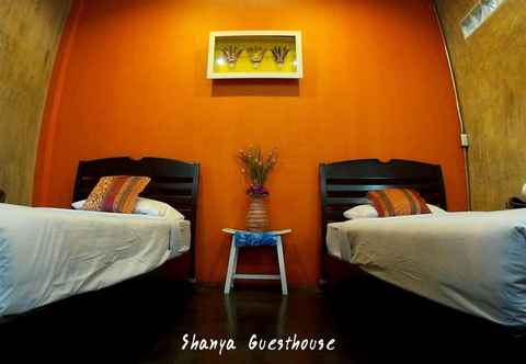 ห้องนอน Shanya Guesthouse