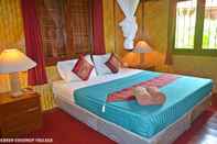 Bedroom Green Coconut Beachfront Villa A3