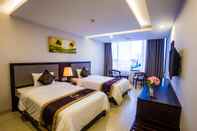 ห้องนอน Golden Quang Tri Hotel