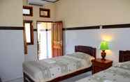 Bedroom 5 Sayang Beach Lodging