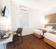 Bedroom 7 Genio Hotel Manado