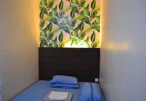 Bedroom Sentosa Guesthouse Makassar