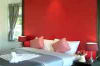 ห้องนอน Baan Rim Klong Resort