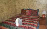 Phòng ngủ 4 Pondokhadihomestay