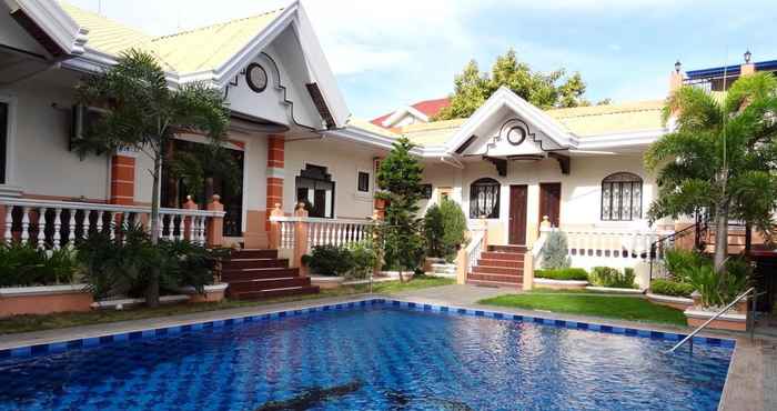 Bangunan The Executive Villa Inn & Suites