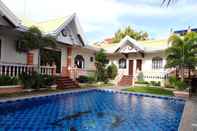 Bangunan The Executive Villa Inn & Suites