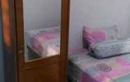 Kamar Tidur 4 Alex House Semarang