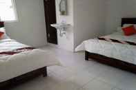 Kamar Tidur Yustin Family Homestay