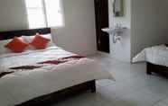 Kamar Tidur 2 Yustin Family Homestay